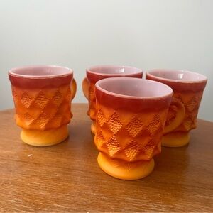 set of 4 vintage Fire-King Kimberly Diamond mugs in an ombre red-orange color